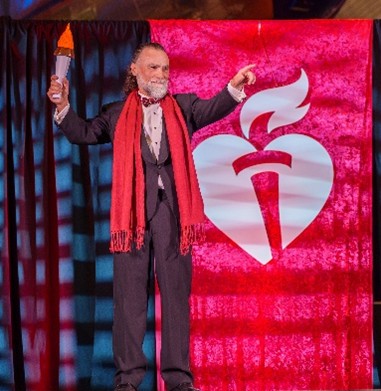 Mark on stage at the AHA Detroit Heart Ball
